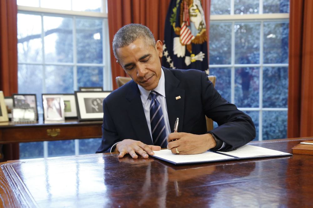 Barack-Obama-signing-law_executive-action.jpeg